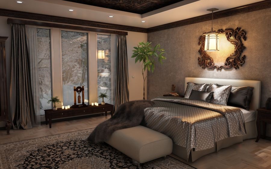 An elegant bedroom with candlelight and flowing draperies.